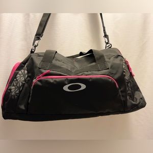 Oakley black and pink sports duffle with shoe compartment
